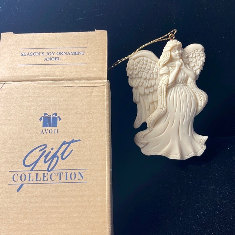 Avon Vintage NIB “Season’s Joy Ornament Angel” Cream w/gold hanging string.